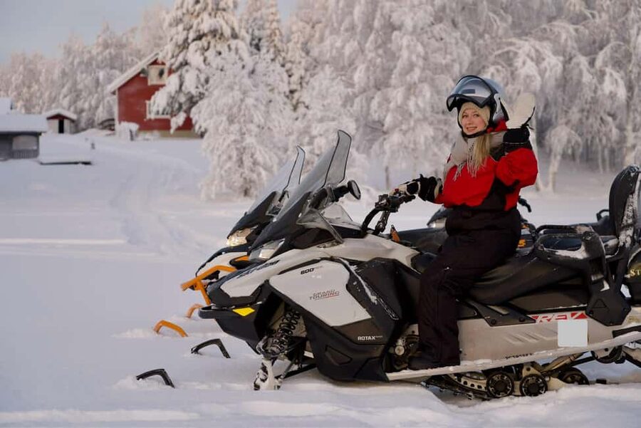 Rovaniemi: Ice Fishing and Snowmobile Tour with Snacks - Getting dressed for real Lapland cold