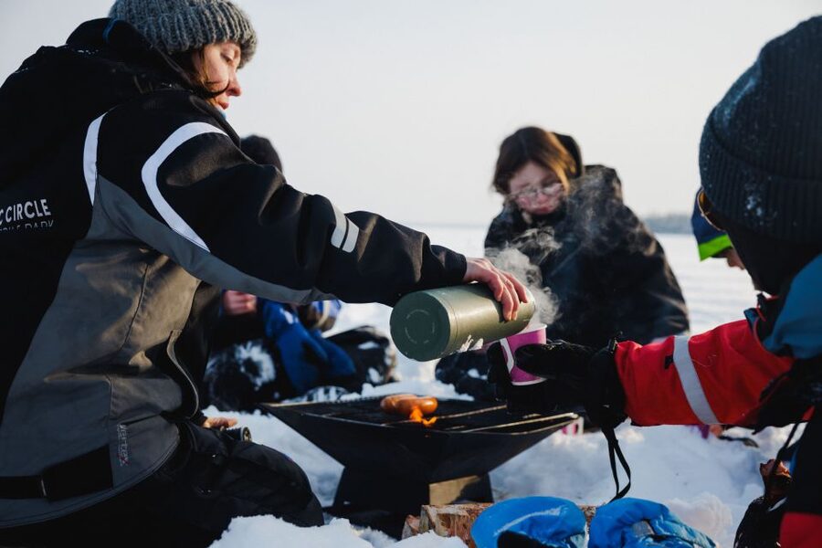 Rovaniemi: Ice Fishing & Snowmobile Safari Combo Day - Guides, stories, and group size