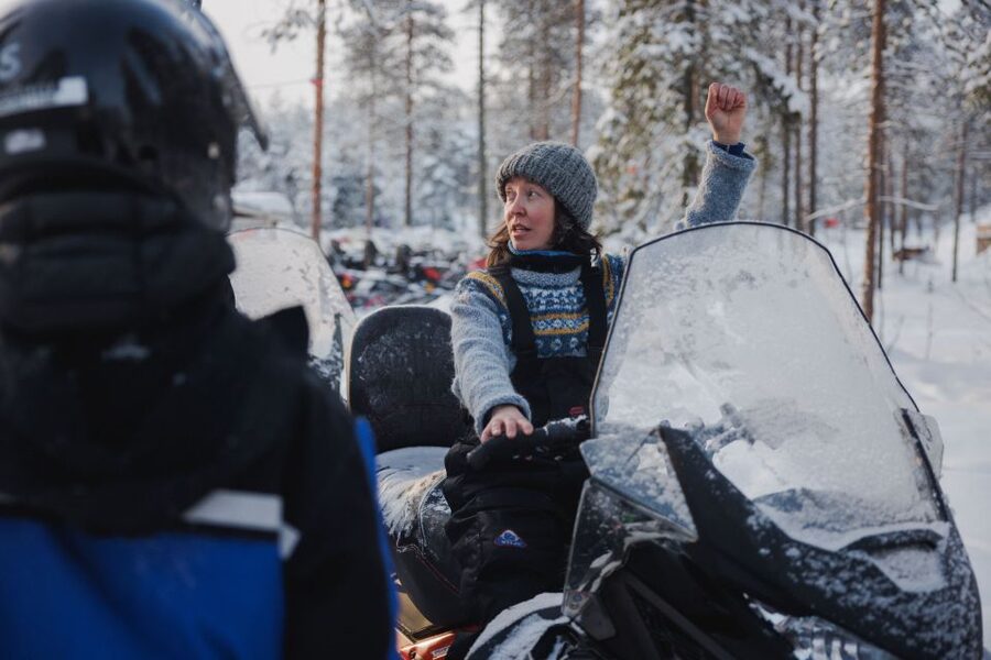Rovaniemi: Ice Fishing & Snowmobile Safari Combo Day - Getting dressed for the snowmobile ride