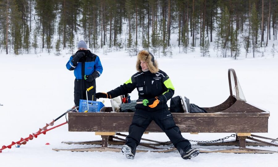 Saariselkä: Ice Fishing Safari by Snowmobile - Riding through forests and open fells
