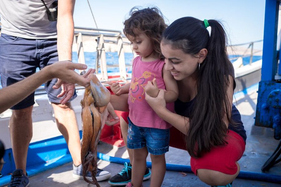 Santorini Sunset Fishing Trip with Dinner and Drinks - What the small group changes