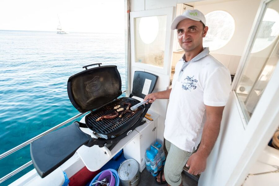 Santorini: Traditional Fishing Trip and Fresh Fish Lunch - Fresh fish lunch cooked on board