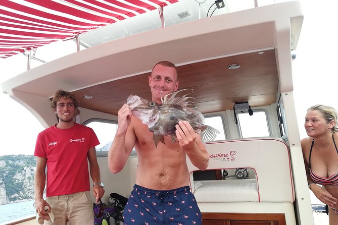 Shared trip with fishing and visit the beauty of Capri island - Punta Campanella and the Fishing Session