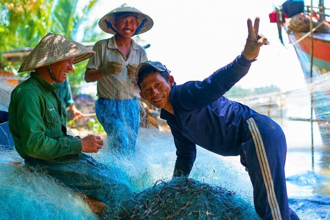 Small Group Bicycle Tour with Farming and Fishing Experience - Basket boats through the coconut waterways
