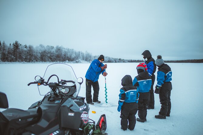 Snowmobiling and ice fishing in Apukka Resort, Rovaniemi - From Apukka Resort into the snowy forest