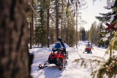 Snowmobiling and ice fishing in Apukka Resort, Rovaniemi