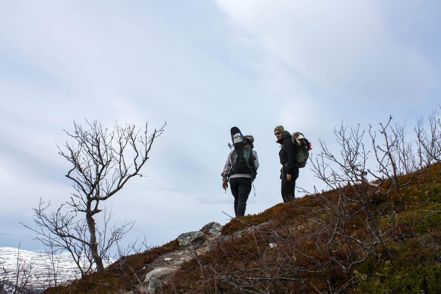 Tromsø: Ice Fishing and Snowshoe Hiking with a Local Guide - Four hours by the fire